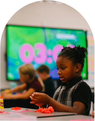 girl playing with playdough